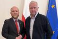 Денис Кучинский и глава политического кабинета премьер-министра Польши Павел Грась. Варшава, 20 октября 2026 года. Фото: пресс-служба Светланы Тихановской