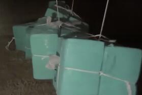 В Польшу залетел метеозонд-тройка с сигаретами. Скриншот видео Пограничной службы Польши